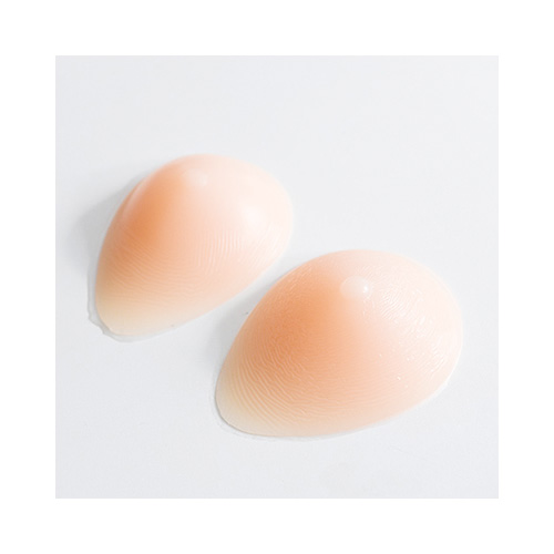 シリコン製疑似乳房（乳首色なし）